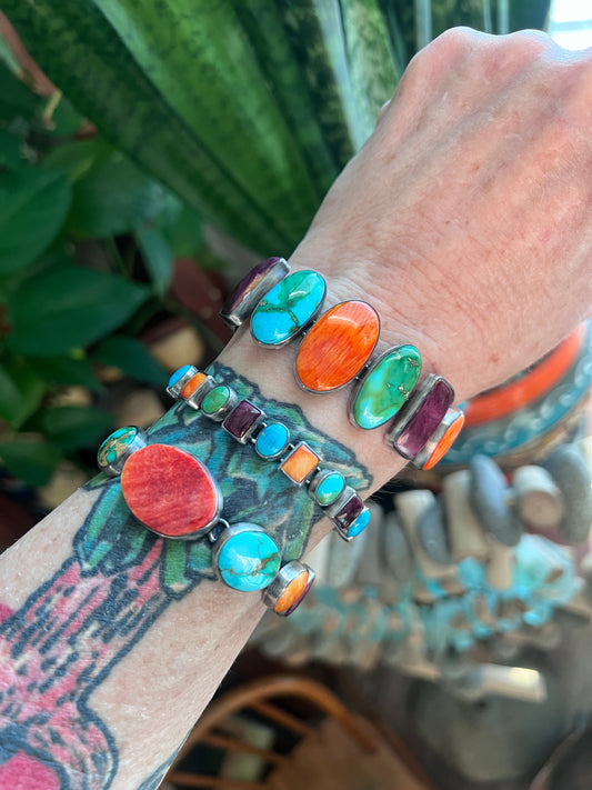 Loretta Delgarito Sterling Silver Electric Rainbow Link Turquoise and Spiny Oyster Bracelet: Ovals, Circles and Pears
